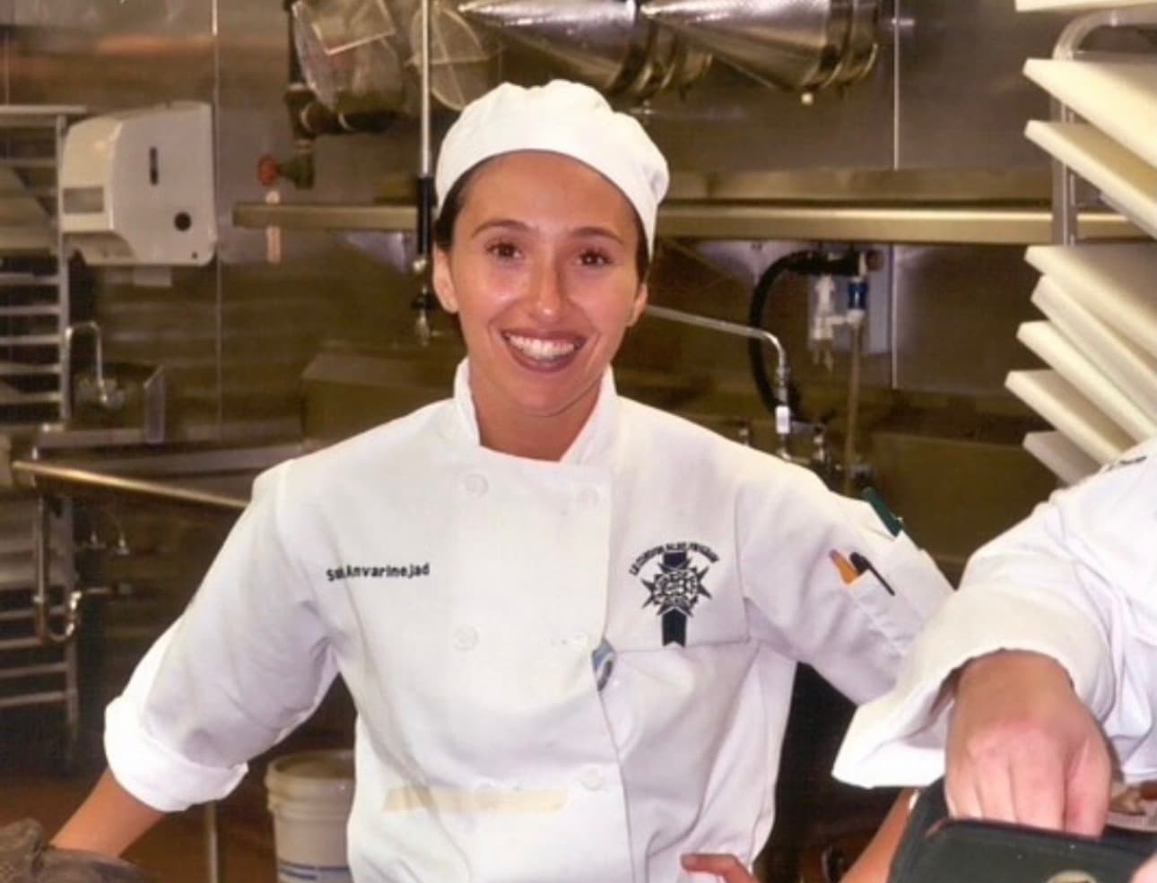 Sahel in her chef's uniform